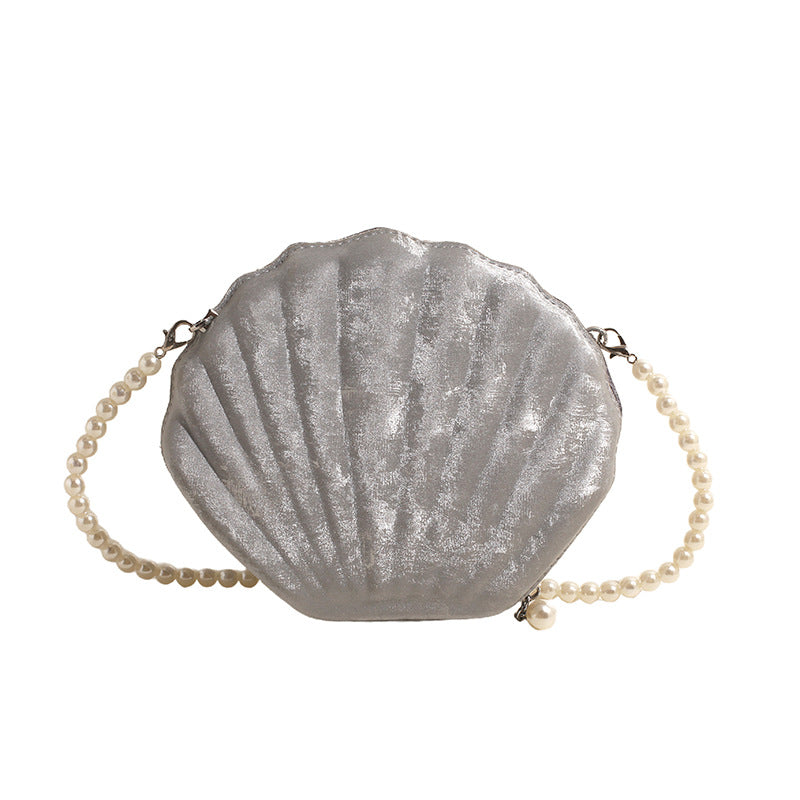 Shell-shaped shoulder bag