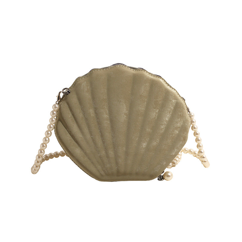 Shell-shaped shoulder bag